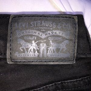Black high rise Levi’s jeans